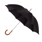 Handcrafted classic umbrella with black canopy, brass shaft, and malacca wood handle – made in Italy, entirely plastic-free
