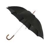 Handcrafted classic umbrella with green canopy, brass shaft, and bamboo wood handle – made in Italy, entirely plastic-free